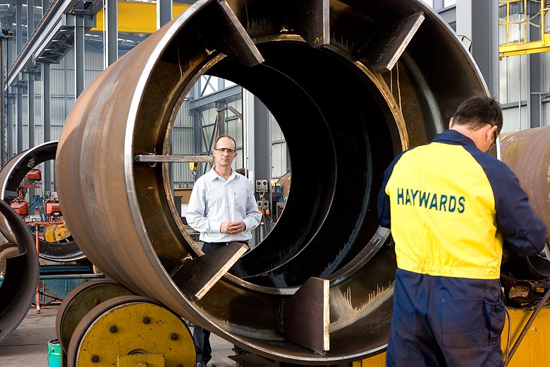 Steve Edmunds of heavy engineering company Haywards with a section of a Melbourne project, the Southern Star Observation Wheel, comprising mostly Grade 350 XLERPLATE® steel.
