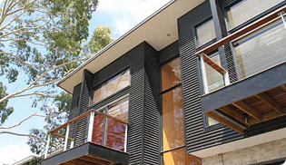 Architect, Greg Jones' home is clad in LYSAGHT CUSTOM ORB&reg; in ZINCALUME&reg; steel and COLORBOND&reg; steel in the colour Night Sky&reg;