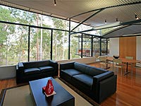 This house, designed by Queensland architect Eddie Codd, features extensive use of LYSAGHT CUSTOM ORB&reg; cladding for walls, roofs and ceilings