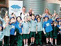 (From left, back row) Andrew Cropp, NSW Regional Business Manager for BlueScope Water,
Dr Peter Coombes and school principal Gai O’Neill with Erskineville Public School students.
