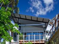 This house in Glen Osmond, South Australia, uses structural formwork in profile LYSAGHT BONDEK® and roofing and walling cladding made from ZINCALUME® steel. Photograph:  Paul Bradshaw