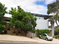 This house in Glen Osmond, South Australia, uses structural formwork in profile LYSAGHT BONDEK® and roofing and walling cladding made from ZINCALUME® steel. Photograph:  Paul Bradshaw