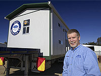 Mordek Manager Errol Thomas with one of his company’s completed cabins