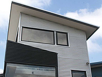 Architect, Greg Jones' home is clad in LYSAGHT CUSTOM ORB&reg; in ZINCALUME&reg; steel and COLORBOND&reg; steel in the colour Night Sky&reg;