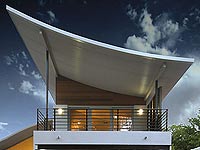 Bold roof designs feature COLORBOND® and ZINCALUME® steel in these two homes in Canberra.