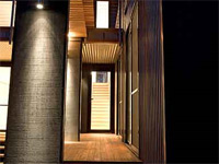 This family holiday home at Pindimar Bay on the north shore of Port Stephens, New South Wales uses LYSAGHT CUSTOM ORB® roofing and wall cladding in colours Jasper®, Dune® and Ironstone®.