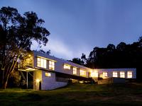 This house at Gidgegannup, Western Australia uses LYSAGHT CUSTOM ORB® made from ZINCALUME® steel for the cladding, roofing, and soffits to create a sophisticated version of the farming aesthetic of sheds and other buildings. Photograph: Patrick Bingham-Hall