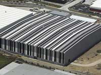 A unique new building in Sydney's west is clad in 21,000 square metres of LYSAGHT INTEGRITY® 820 made from COLORBOND® steel in dark and light colours give the building an unmistakeable presence.