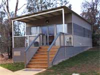 Shakespeare Centre for Scouting at Camp Cottermouth, ACT features modular buildings with roofing made from COLORBOND® steel in colour Dune® and walling in the colours Bushland® and Woodland Grey®.
