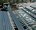 &ldquo;On-site roll forming was the answer, but the roll forming mill also had to have the capability to output sheets directly to the roof frame, so that we could avoid having to use multiple cranes to lift them into position.&rdquo;
