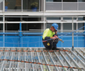 LYSAGHT BONDEK&reg; - fix BONDEK&reg; sheets to steel beams if required