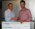 Jason Chambers (right) receiving his prize from BlueScope Steel's Garth Weston