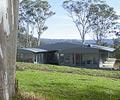 A block of land the Illawarra Escarpment inspired an architect’s design which included panoramic areas of glass as well as LYSAGHT CUSTOM ORB® sheeting
