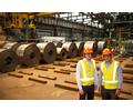 BlueScope Steel manufacturing and product leader, Jason Hodges (left) and market manager, Manu Siitonen, at Port Kembla’s Spring Hill Metal Coating Lines, where longer-lasting Next Generation ZINCALUME&reg; steel is produced.