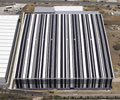 Alternating sheets of LYSAGHT INTEGRITY&reg; 820 in Night Sky&reg; and Surfmist&reg; provide a barcode graphic.