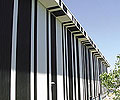 Alternating sheets of LYSAGHT INTEGRITY&reg; 820 in Night Sky&reg; and Surfmist&reg; provide a barcode graphic.