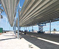 This cattle pavilion's roof is made from 144 metre long continuously rolled ARAMAX roof panels made from GALVASPAN&reg; G550 steel.
