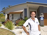 Tony Withers outside one of his award winning homes. 