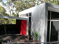 This Sunshine Coast home is a unique design clad almost entirely in LYSAGHT CUSTOM ORB&reg; profile roll formed in ZINCALUME&reg; steel.