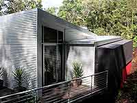 This Sunshine Coast home is a unique design clad almost entirely in LYSAGHT CUSTOM ORB&reg; profile roll formed in ZINCALUME&reg; steel.