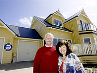 Ron and Rysha Hosking of Farm Houses of Australia outside one of their latest homes