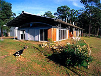 Lindsay Johnston's 'Four Horizons' home at Watagan Forest, near Newcastle features roofing and walling made from COLORBOND® steel.