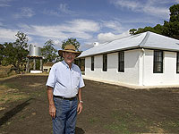 Ian Kiernan and the restored Westham Farmhouse, Bathurst, New South Wales which was restored with the assistance of modern products such as COLORBOND® steel, ZINCALUME® steel and BlueScope Water WATERPOINT® rainwater tanks.