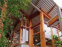 The design of this studio and carport addition incorporated corrugated ZINCALUME® steel for the roof and wall cladding.