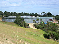 Water tanks being fabricated from XLERPLATE® steel, will replace open reservoirs.
