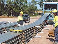 Onsite roll forming of LYSAGHT KLIP-LOK 700 HI-STRENGTH&reg; concealed fix cladding at Nexus Industry Park at Prestons, Sydney.