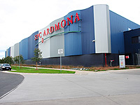The striking walls of the SPC Ardmona warehouse in Shepparton are clad in LYSAGHT CUSTOM ORB&reg;.