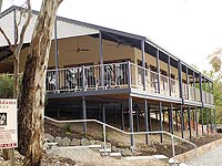 Tim Adams Wines winery office and cellar door facilities. - entire property was re-clad and re-roofed using LYSAGHT CUSTOM ORB® profile. Tim selected COLORBOND® steel in Classic Cream® for the walls, and in Surf Mist® for the roof.