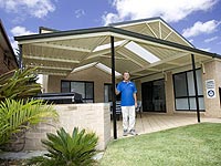 Colin Tarman, whose company builds pergolas with roofing made from LYSAGHT TRIMDEK&reg; or LYSAGHT CUSTOM ORB&reg;. Tarnel Constructions is a member of the STEEL BY&trade; Brand Partnership Program.