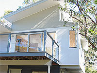Renovated classic 1960s beach house on the north side of Jervis Bay, NSW features extensive use of LYSAGHT CUSTOM ORB®.