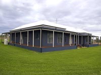 The Diamonds&rsquo; house covers nearly 60 squares and features walls and roof clad in LYSAGHT&reg; CUSTOM ORB&reg;  profile in the COLORBOND&reg; steel colours Dune&reg;  (roof) and Deep Ocean&reg;.