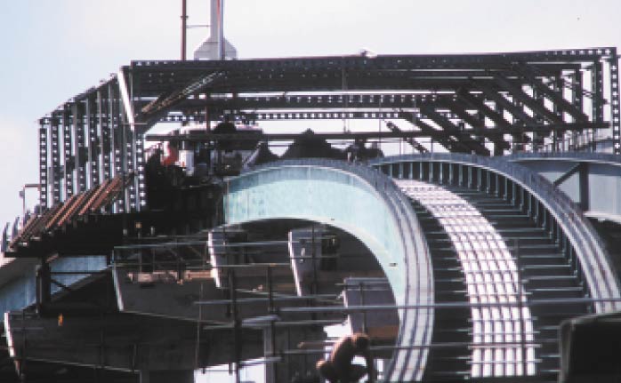 Hindmarsh Island Bridge is a composite structure of steel girder and concrete deck providing access between Goolwa and Hindmarsh Island, South Australia. Mobile formwork for the deck was carried on a wheeled frame.