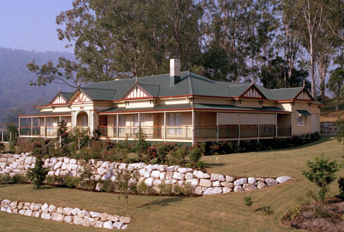 Reproduction of 1880's Colonial Homestead at Tamborine in the Gold Coast Hinterland with steel roofing in Cottage Green® COLORBOND® .
