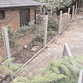 Set bottom rails into positon ensuring 50mm ground clearance