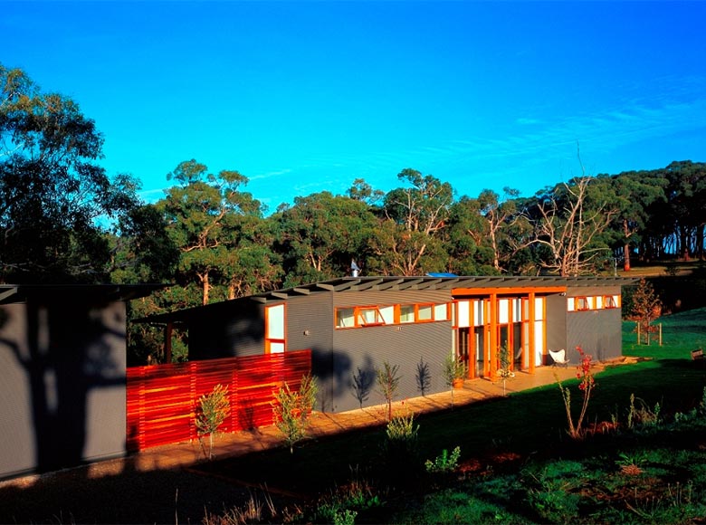 This farm house at Main Ridge is clad in LYSAGHT MINI ORB® in Woodland Grey® COLORBOND® steel. LYSAGHT CUSTOM ORB® was selected for the roof.