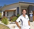 Tony Withers outside one of his award winning homes. 