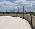 LYSAGHT SMARTASCREEN® fencing made from COLORBOND® steel used at Birmingham Gardens greyhound racing facility.