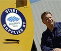 Daniel Parker of Parker Silos and Sheetmetal with his Wildcat Chaser Bins