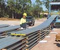 Onsite roll forming of LYSAGHT KLIP-LOK 700 HI-STRENGTH® concealed fix cladding at Nexus Industry Park at Prestons, Sydney.