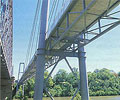 Jack Pesch Bicycle and Pedestrian Bridge which spans the Brisbane River. The concrete deck is supported by, and acts compositely with, two fully welded steel trusses made from Grade 350 XLERCOIL&reg; RHS sections.