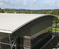 Curved roof made from LYSAGHT KLIP-LOK 700 HI-STRENGTH® concealed fix cladding which was rollformed directly to the roof frame by BlueScope Lysaght’s mobile rollforming rig.