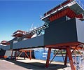 Gypsum storage silo located in Rozelle, Sydney, clad in LYSAGHT CUSTOM ORB®