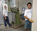 Chris Fullerton (left) and Maurice Ngatoko from Coast and Country Water Tanks, a member of the STEEL BY™ Brand Partnership Program, rollform tanks from AQUAPLATE® steel.