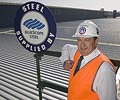 Peter Ebzery, Sales Manager of Murphys Metal Roofing and Facade Services, a member of the STEEL BY™ Brand Partnership Program which uses about 300 tonnes of BlueScope Steel roofing products per year.