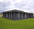 The Diamonds house covers nearly 60 squares and features walls and roof clad in LYSAGHT? CUSTOM ORB?  profile in the COLORBOND? steel colours Dune?  (roof) and Deep Ocean?.