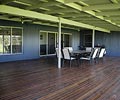 The Diamonds house covers nearly 60 squares and features walls and roof clad in LYSAGHT? CUSTOM ORB?  profile in the COLORBOND? steel colours Dune? (roof) and Deep Ocean?.